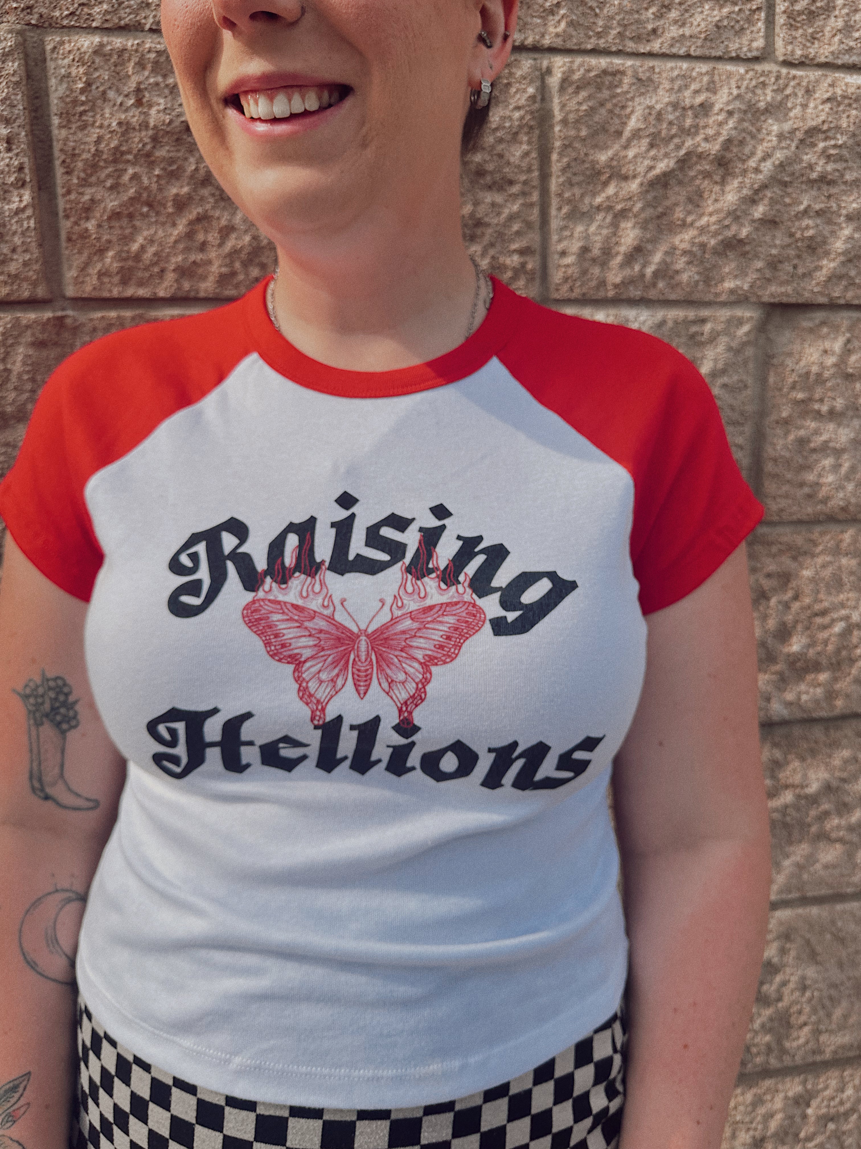 Raising Hellions -- Women’s micro rib raglan baby tee